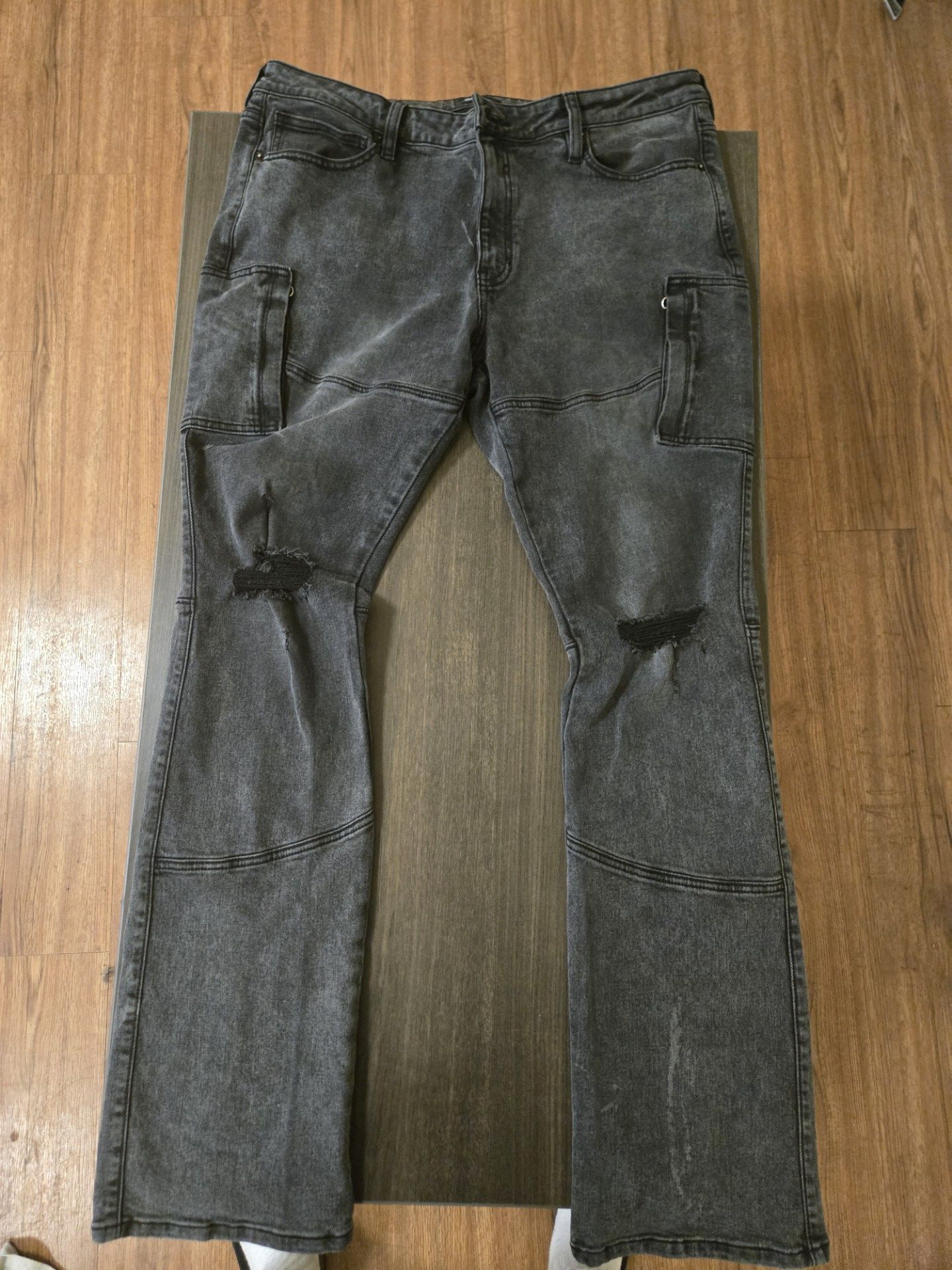 Purple Brand Tinted Worn Flare Cargo Jeans in black.