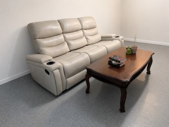 Ivory Leather couch with center console