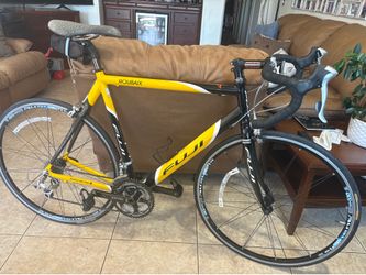 Fuji    Roubaix   2. Road bike.    Carbon fork.