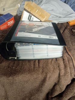 Binder of football cards