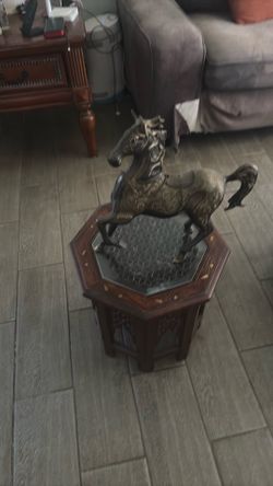 Brass horse with wood pedestal table with inlay