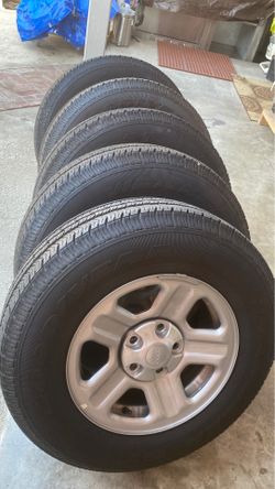 GOODYEAR WRANGLER TIRES W/ RIMS