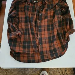 2 Universal Thread flannel shirts and 1 Zella pullover. Near downtown Vancouver.