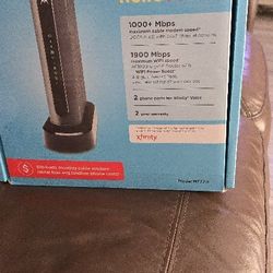 MOTOROLA CABLE MODEM WITH WI-FI ROUTER AND 2 OHINE LINES ORG.$190. ONLY $40.