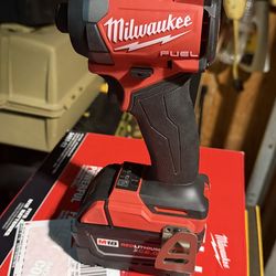 BRANDNEW M18 IMPACT AND  BATTERY ONLY