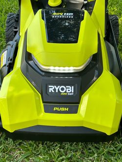 $225$. 40V HP Brushless 21 in. Cordless Battery Walk Behind Push Lawn Mower with 6.0 Ah Battery and Charger