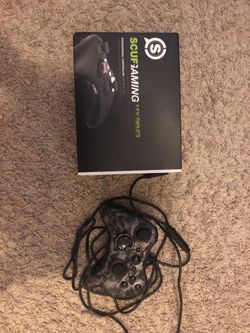 Xbox 360 Gaming Controller(The ring in the middle turns purple when on)