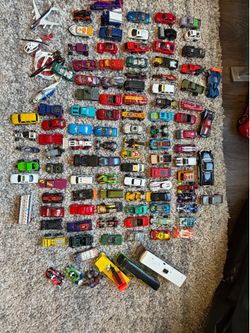 Hot Wheels and Various track pieces