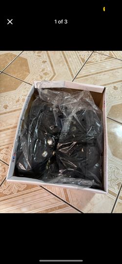 Brand new Black fuzzy shoes with charms