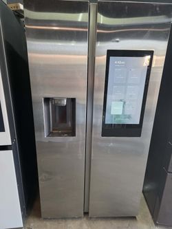 Samsung stainless steel side by side refrigerator with Family Hub.