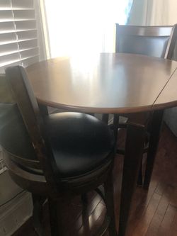 Two bar and table stools