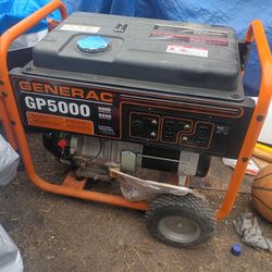 Generac GP5000 portable generator. 
It has a running wattage of 5000 and a starting wattage of 6250. 
It is a gasoline-powered conventional generator.