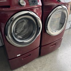 Front load Samsung washer and front load Samsung dryer electric with pedestals cherry color in excellent working condition extra for delivery same day