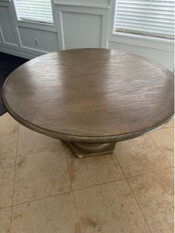 Round table seats 6 comfortably