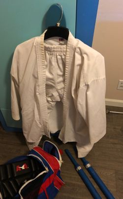 Karate suit and bag full of equipment