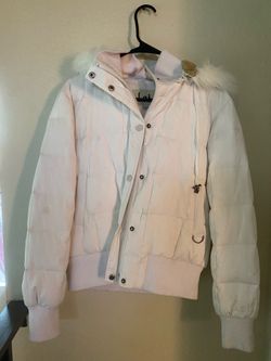 Woman’s white jacket
