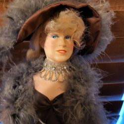 Vintage may west doll with stand perfect , fifty dollars