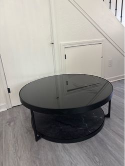 Black glass top coffee table