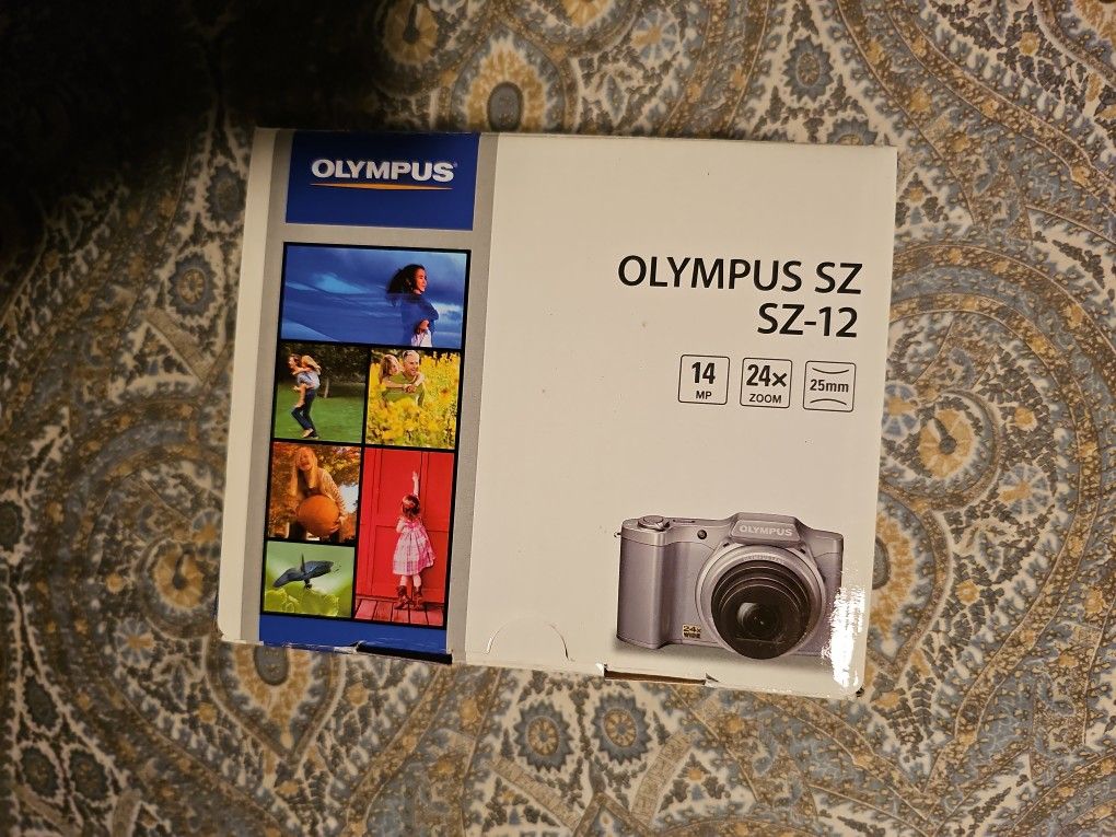 Olympus SZ-12 14MP digicam w/ 8GB SD card (serial JJ4239414) – New
