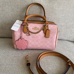 Powder Pink coach Rowan