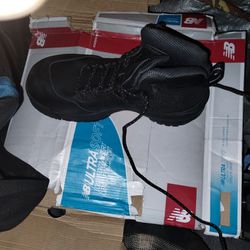 Black Pair Of New Balance Work Boots
