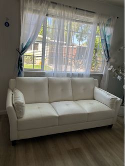 White leather sitting room three pieces, sofa, loveseat, and single chair