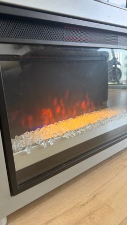 TV Stand con chimenea eléctrica- (Como nuevo)