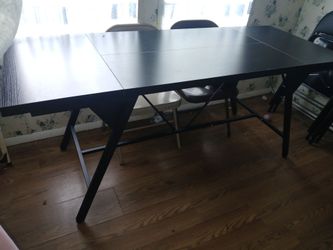 Sturdy black dining room table