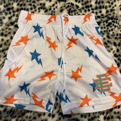 White Bape EE shorts with blue, and orange stars size medium