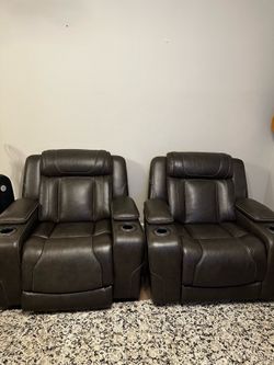 Two Ashley reclining chairs