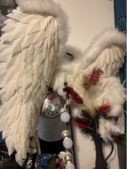 Large white wings with silver glitter