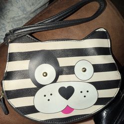 NWT!! Luv Betsey Johnson Dog Wristlet Coin Purse Black and white stripes located off lake mead & Simmons area asking $5