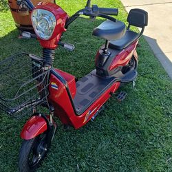 Electric scooter bicycle new never used.
