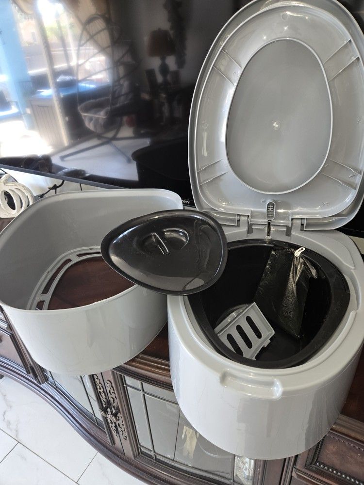 NEW NEVER USED PORTABLE TOILET