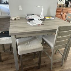 TABLE WITH FOUR CHAIRS INCLUDED 