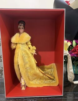 Barbie Signature Guo Pei Golden yellow gown