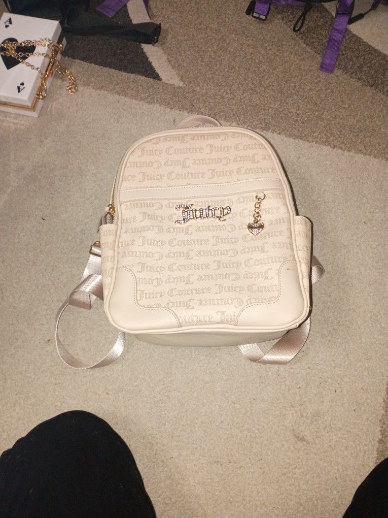 Juicy Couture Tan Backpack With Cute Charm And Pockets