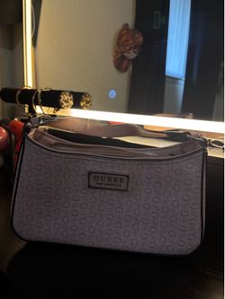 Pink GUESS hand purse