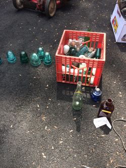 Box of antique of glass insulators, salt and pepper shakers