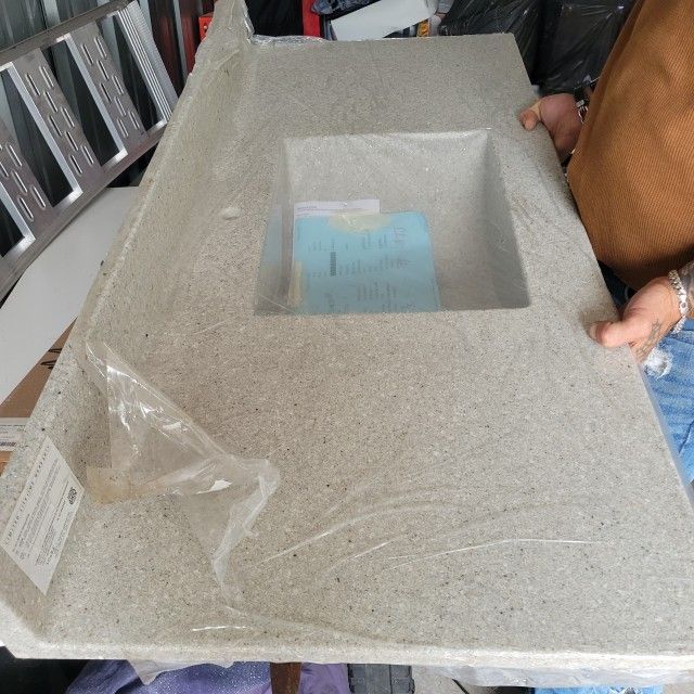 Vanity With Side Spashes And Moen Faucet