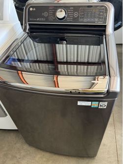 Black stainless 5.2 cu. ft. HE Mega Capacity Top Load Washer with Steam & TurboWash works perfectly. extra for delivery.same day delivery and installa