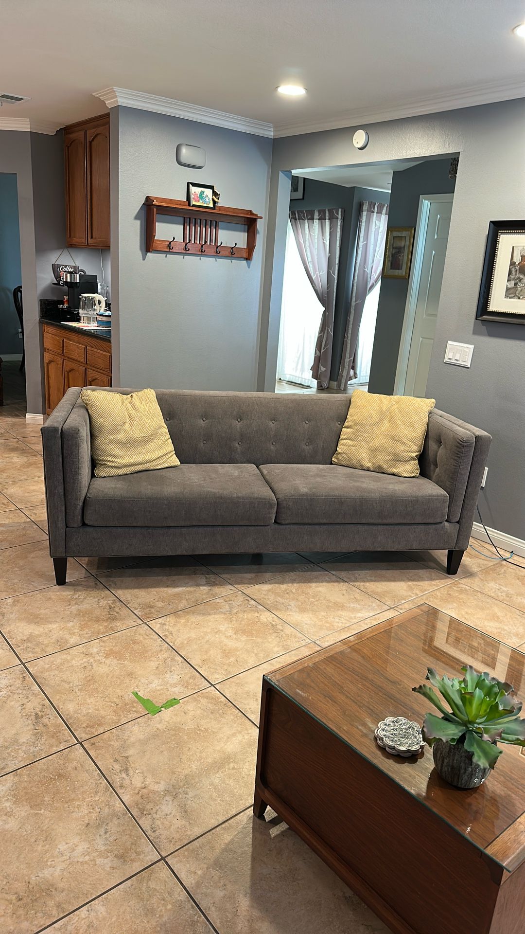 Modern, comfortable and totally nap-worthy Used Couch For Sale!