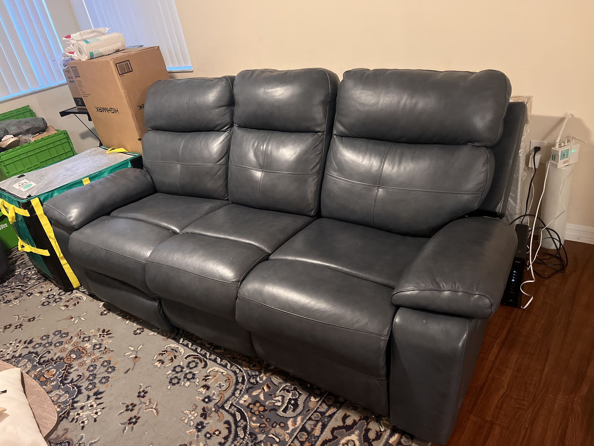 Leather Sofa With Recliner 
