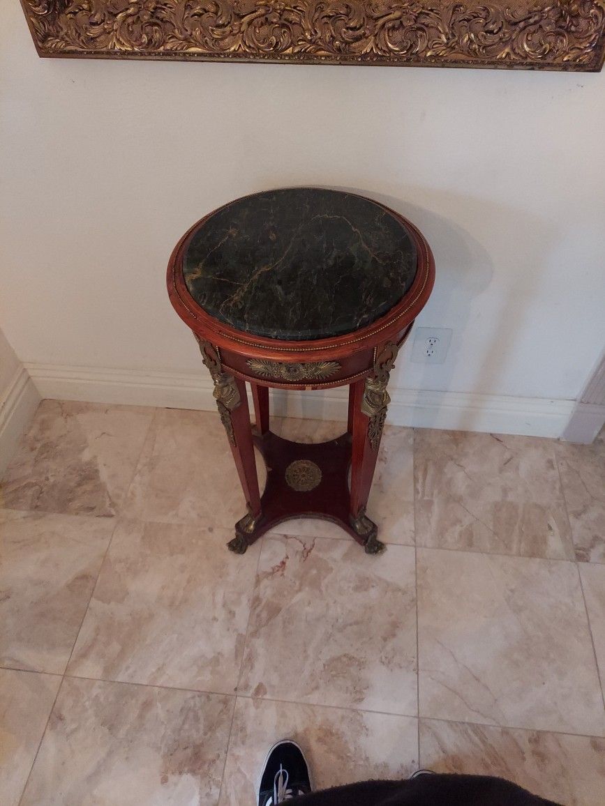 Clean Wooden Marble Stand.