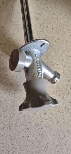 New outdoor faucet, never used.