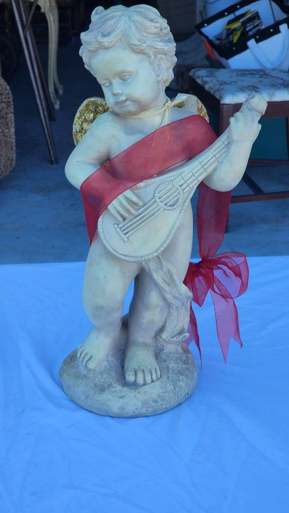 Statue Of Angel With Wings.