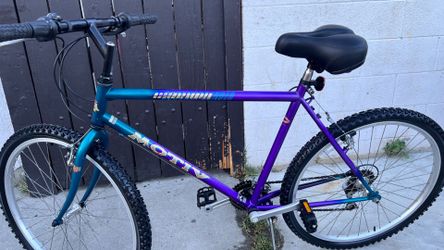 1990s Motiv Groundpounder Mountain Bike, blue-to- purple color scheme