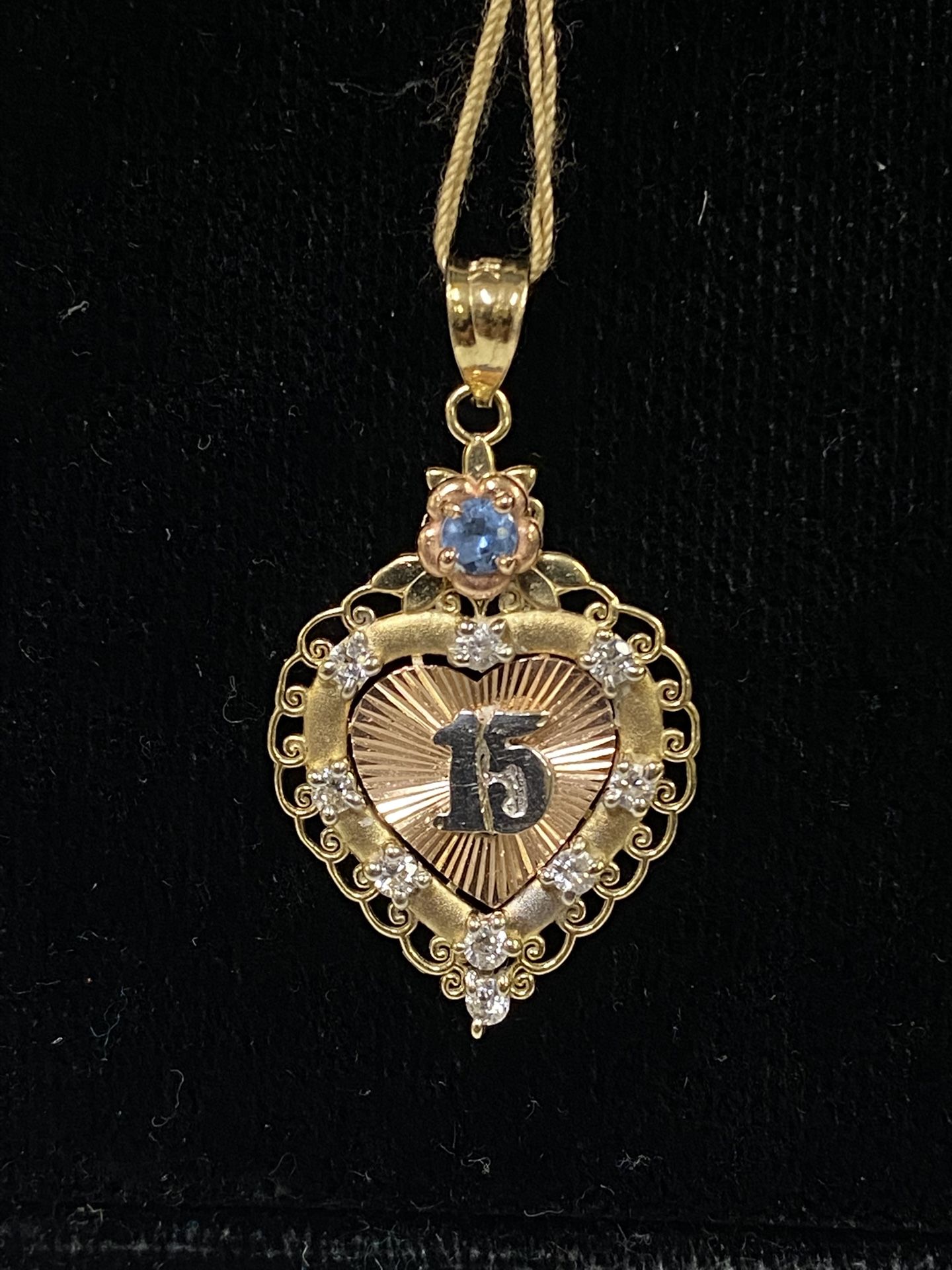14k 3 CZ Topaz “15” Heart Pendant