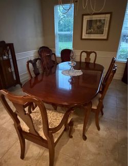 Antique dining room table and chairs