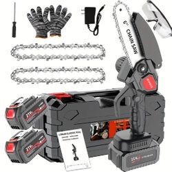 mini Chainsaw.  2 batteries included 